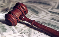 Private Investigator Phoenix wood gavel atop money